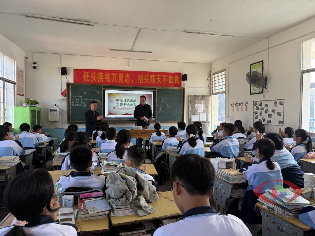 罗江伯到余坪镇张市中学上思政课并调研食品安全工作